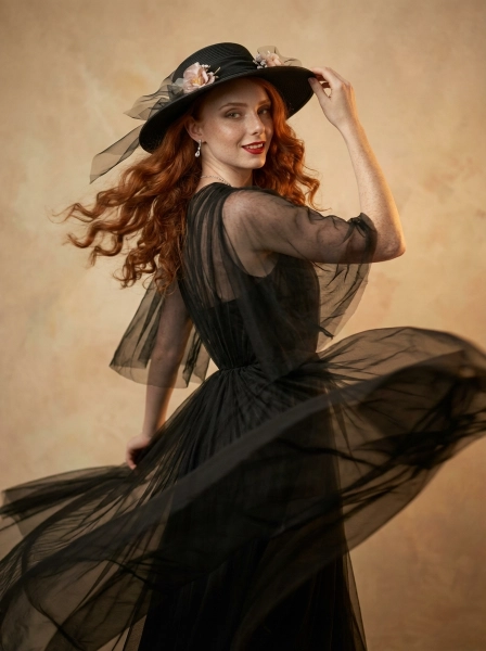 A_woman_with_long_wavy_red_hair_and_freckles_weari-1774540641523